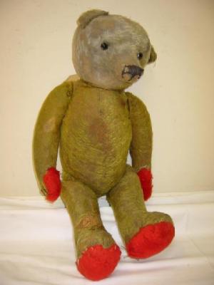 Appraisal: An early th century teddy bear straw filled covered in