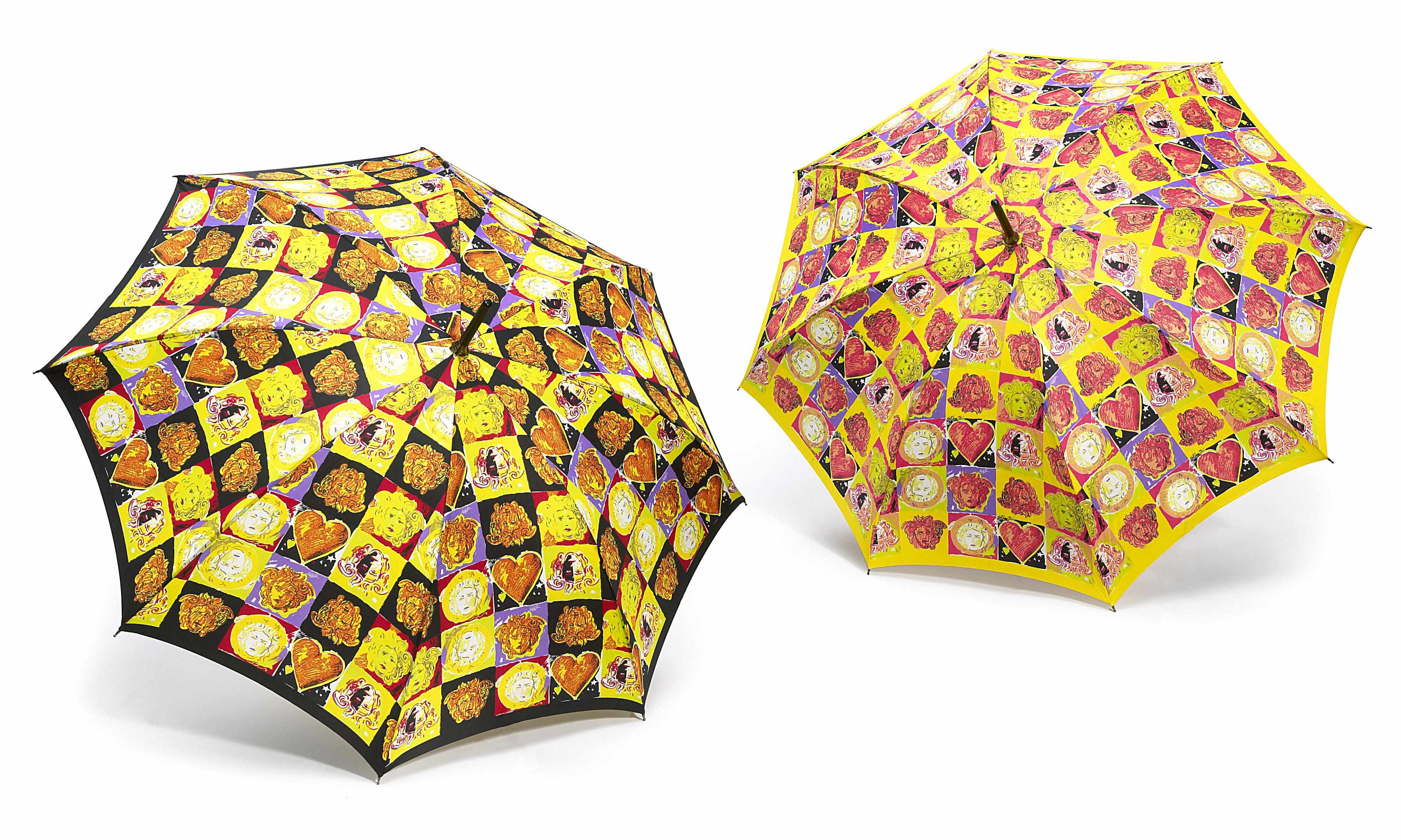 Appraisal: Two Gianni Versace umbrellas height in diameter in