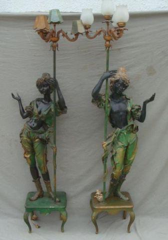 Appraisal: Pair of Blackamoor Torchiere Lamps Neck and arm on one