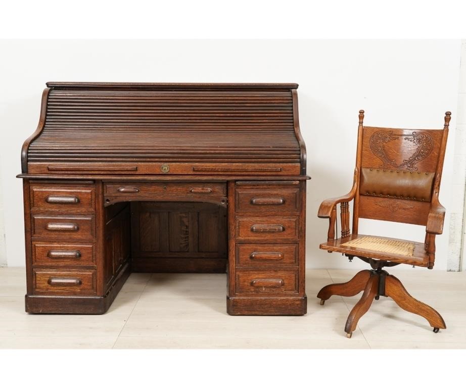 Appraisal: Oak roll top desk circa with multi-drawer interior and a