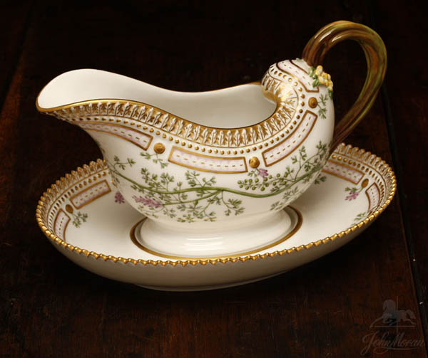 Appraisal: A Royal Copenhagen Flora Danica sauce boat A Royal Copenhagen