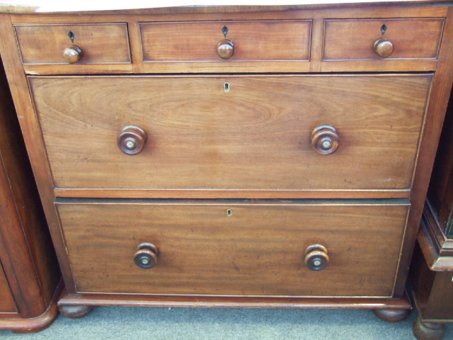 Appraisal: A th century mahogany chest the bow top over three