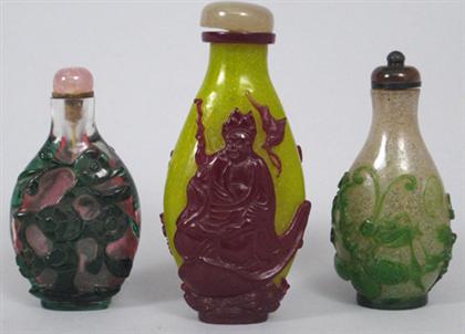 Appraisal: Three Chinese glass overlay snuff bottles th century and later