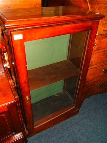 Appraisal: A Victorian mahogany table top display cabinet with glazed single