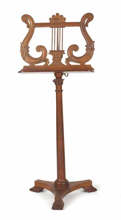 Appraisal: Walnut music stand mid th c with lyre form rack