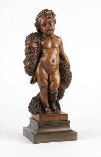 Appraisal: A Continental carved wood figure of a cherub Late th