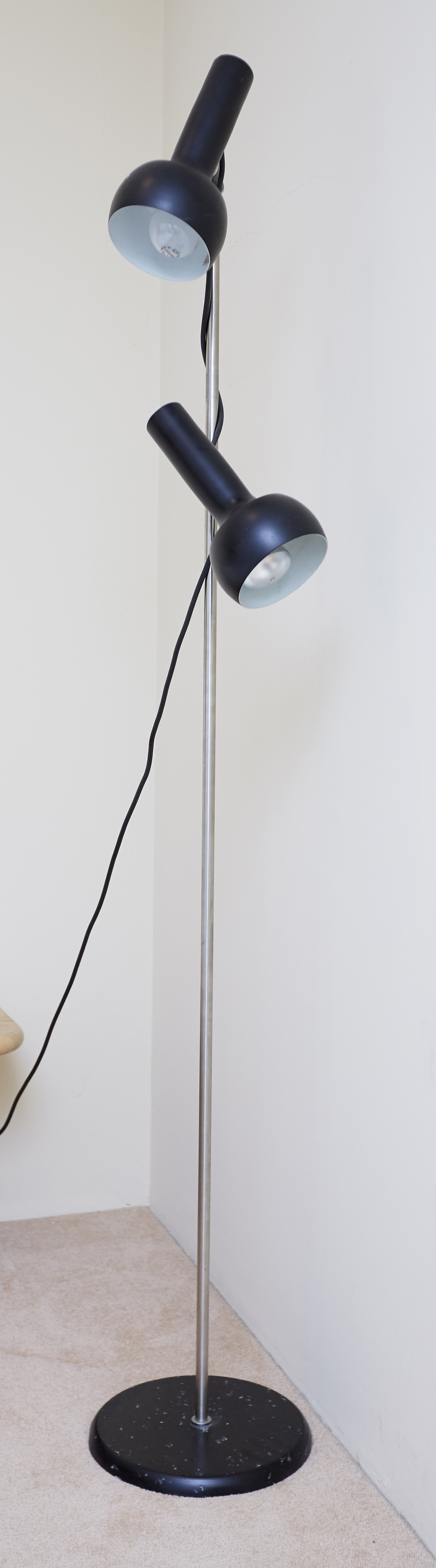 Appraisal: AN OSLO FLOOR LAMP The chrome stand with adjustable lights