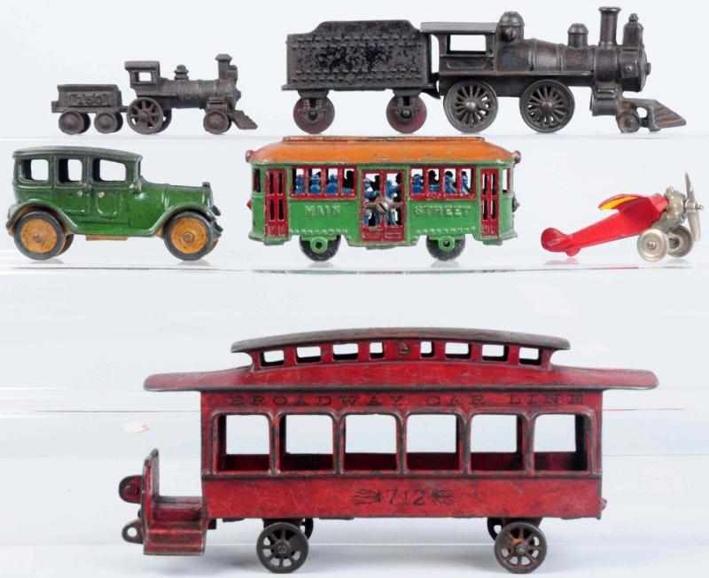 Appraisal: Lot of Cast Iron Vehicle Toys Includes one engine one