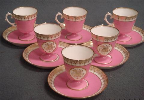 Appraisal: Paris porcelain pink gilt footed cups saucers J Mansard Co