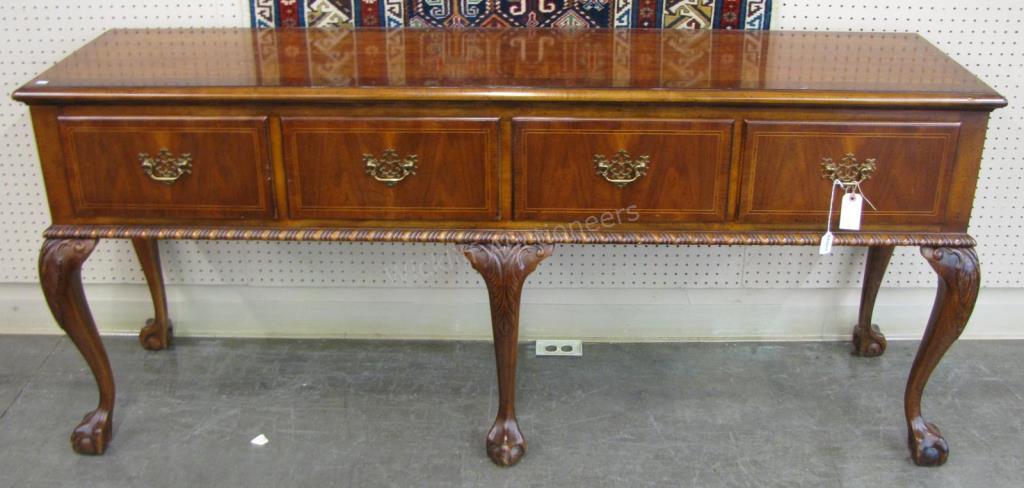 Appraisal: A mahogany Chippendale style console by Baker Furniture with four