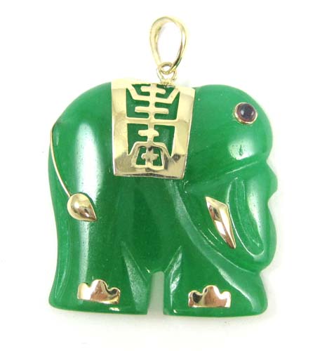 Appraisal: JADE AND FOURTEEN KARAT GOLD PENDANT The green jade elephant