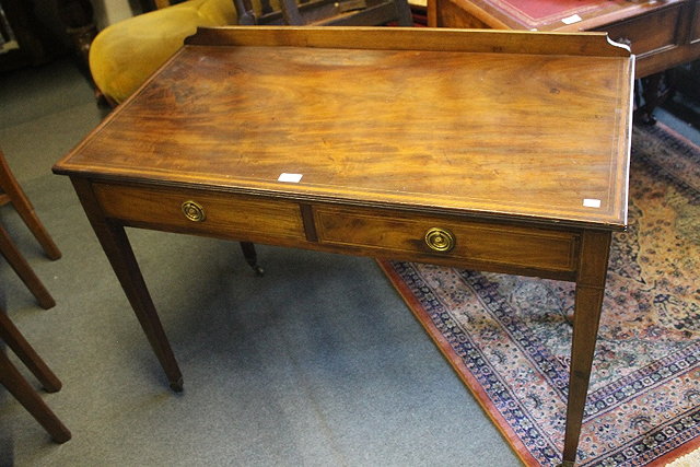 Appraisal: A TH CENTURY MAHOGANY SIDE TABLE fitted two short drawers