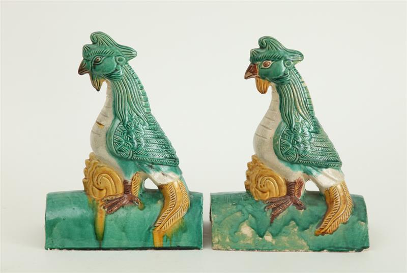 Appraisal: PAIR OF MODERN CHINESE GLAZED POTTERY COCK-FORM ROOF TILES Each