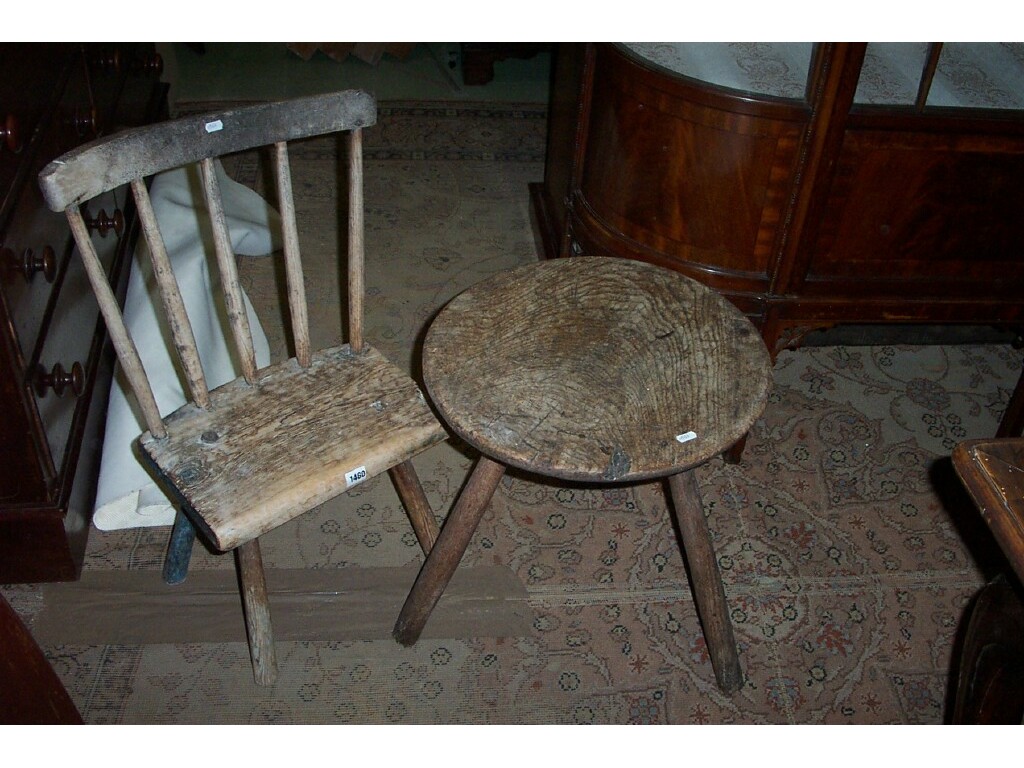 Appraisal: A primitive th century ash wood table raised on three