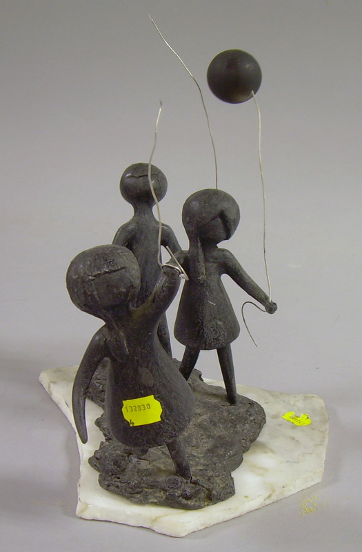 Appraisal: Lot of Four Metal Sculptures including Children with Balloons from