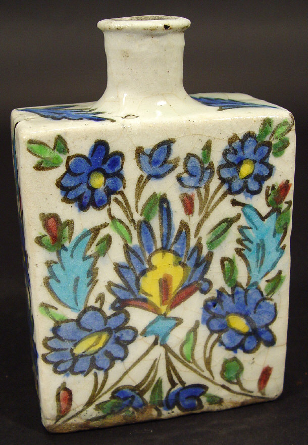 Appraisal: Isnik flat sided pottery flask hand painted with flowers cm