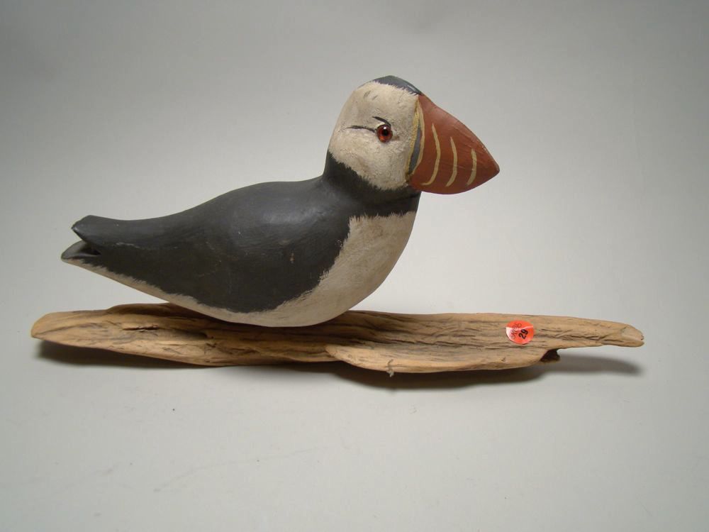 Appraisal: DECORATIVE LIFE-SIZE PUFFIN Signed H Hunt on bottom Mounted on