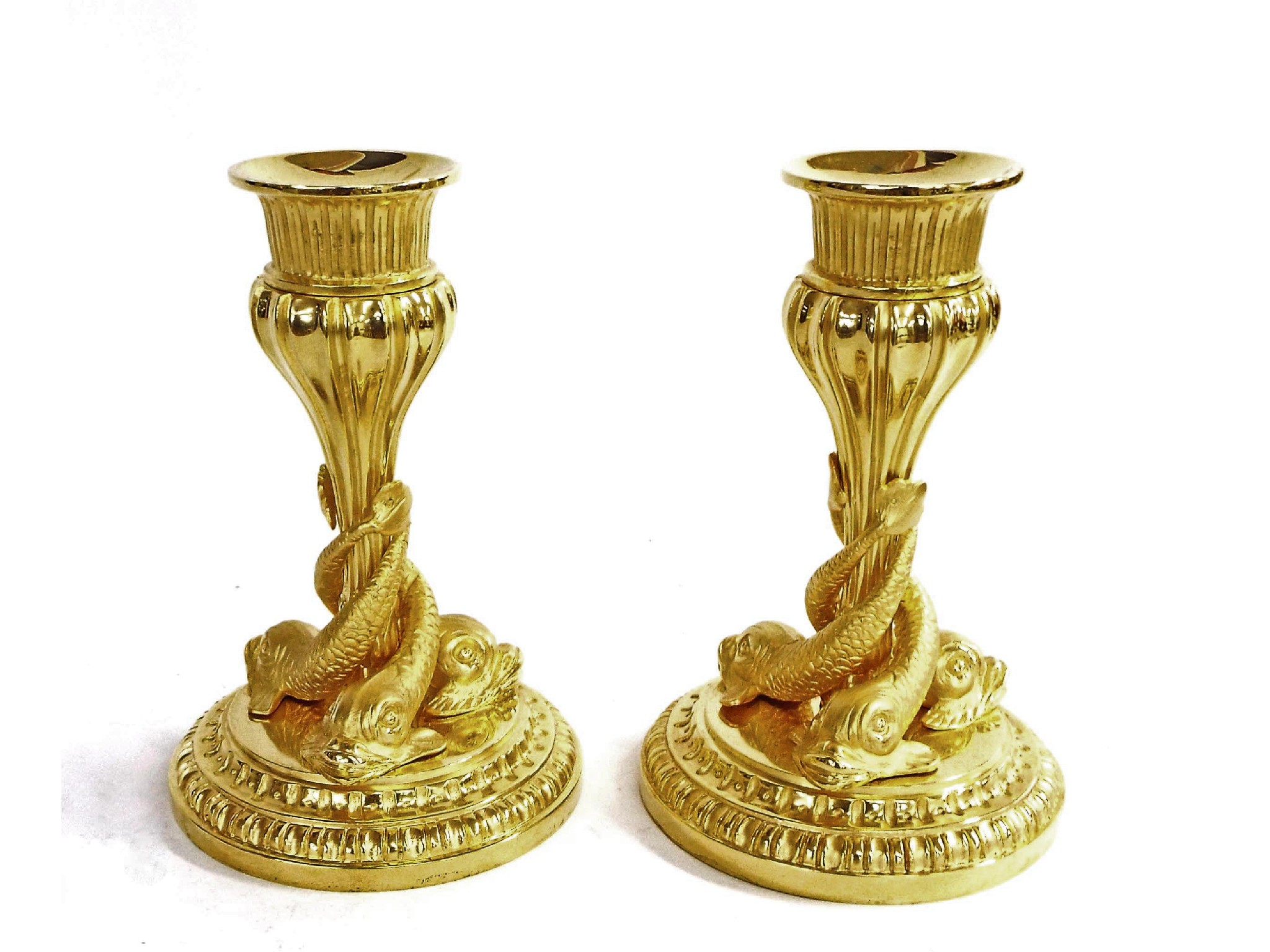 Appraisal: Decorative pair of French ormolu candlesticks the fluted tapered columns