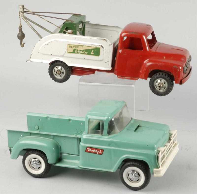 Appraisal: Lot of Pressed Steel Buddy L Truck Toys Description Circa