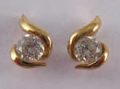 Appraisal: A pair of diamond ear studs accompanied by Certificate of