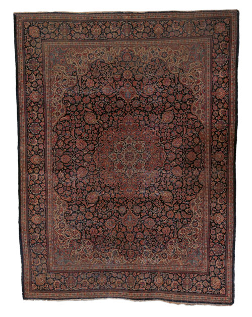 Appraisal: Kashan carpet ca with a central red medallion on a