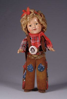 Appraisal: COMPOSTION SHIRLEY TEMPLE DOLL Wearing original cowgirl outfit but no