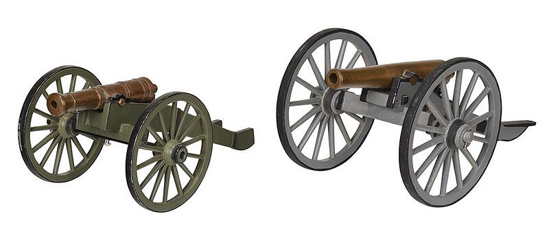 Appraisal: Two Small Signal Cannons larger - in brass cannon on