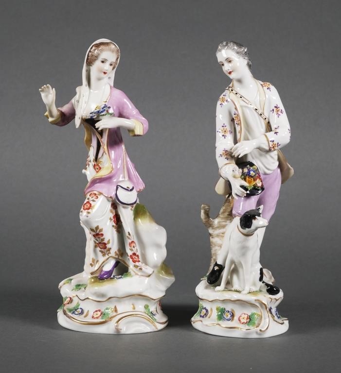 Appraisal: Fine porcelain figurines of a man and woman Woman is