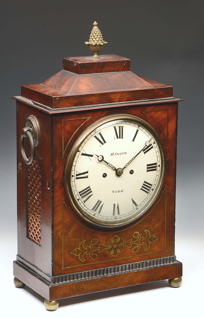 Appraisal: A REGENCY MAHOGANY BRACKET CLOCK the white painted convex Roman