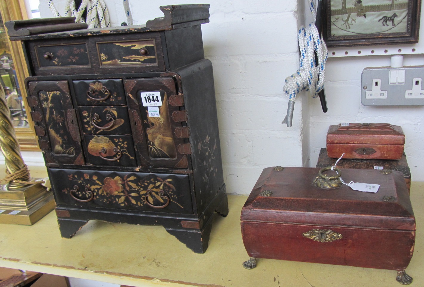 Appraisal: A Japanese black lacquered table cabinet cm high a continental