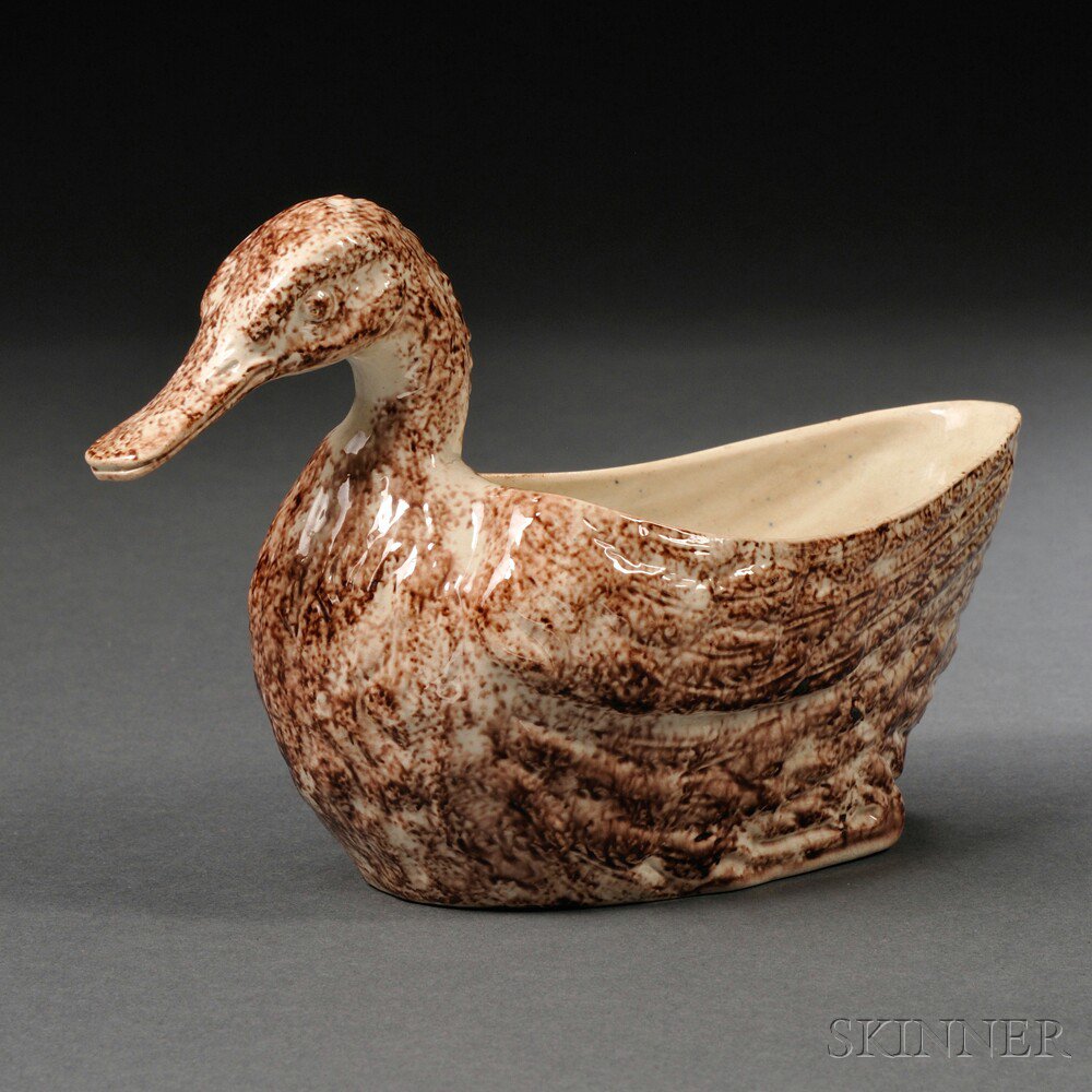 Appraisal: Staffordshire Cream-colored Earthenware Duck-form Sauceboat England c with allover sponged