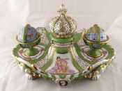 Appraisal: A ceramic reproduction probably French of the famous Duplessis inkstand