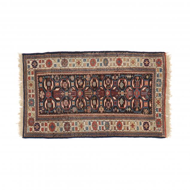 Appraisal: CAUCASIAN SOUMAK AREA RUG Brown field with repeating octagonal medallions