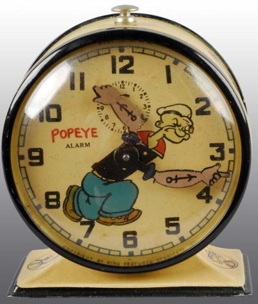 Appraisal: Metal Popeye New Haven Alarm Clock Description Circa Copyright King