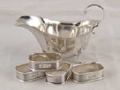 Appraisal: A small silver sauceboat London and a set of four