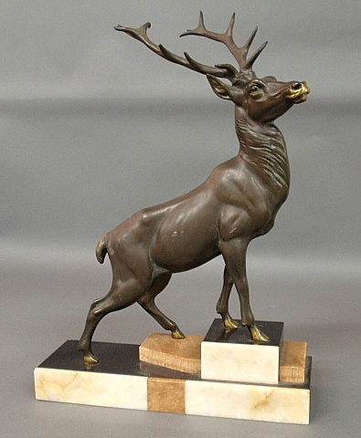 Appraisal: - Bronze Art Deco style stag sculpture mounted on a