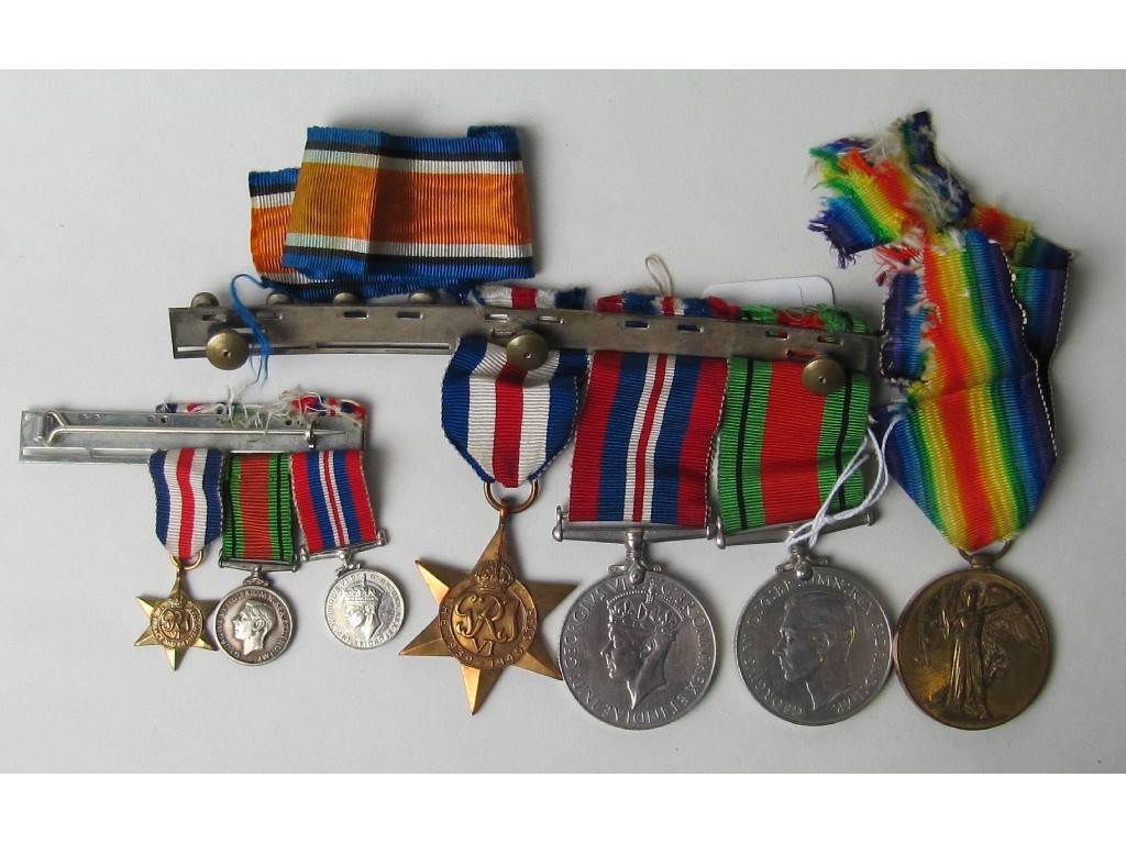 Appraisal: Lot comprising group of three WWII medals a miniature set