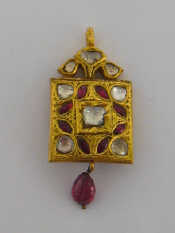 Appraisal: A gold and multigem pendant the chased square panel set