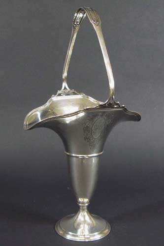 Appraisal: AN AMERICAN STERLING SILVER FLOWER BASKET with fixed handle by