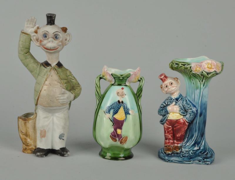 Appraisal: Lot Of Happy Hooligan Majolica Figure This lot includes two