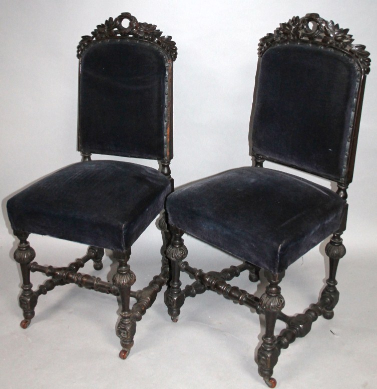 Appraisal: A pair of thC ebonised oak hall chairs each with