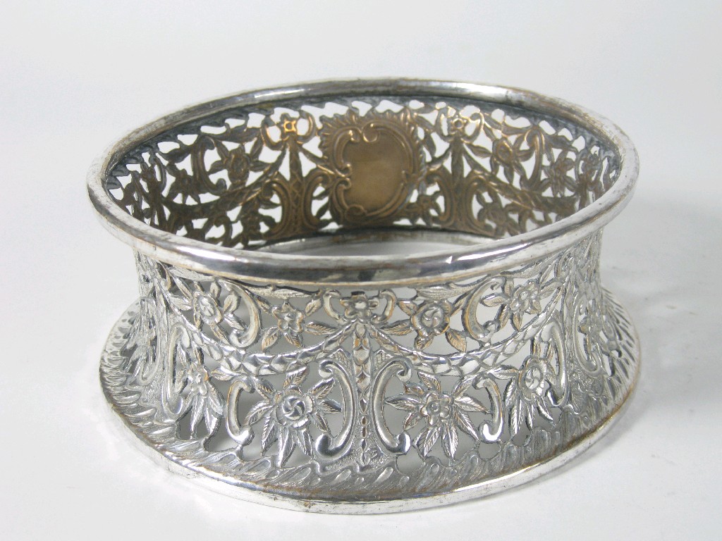 Appraisal: An Edwardian plated Potato Ring with floral and scroll piercing