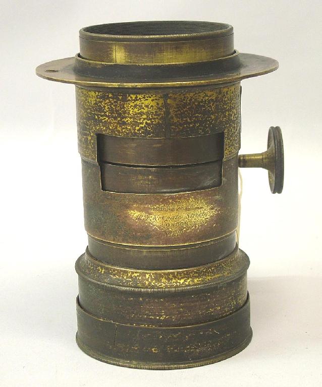 Appraisal: Early Horne Co brass bound lens and cover with rack