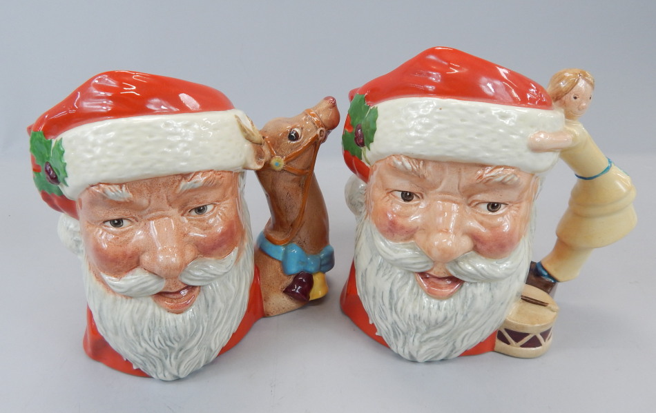 Appraisal: Two Royal Doulton Christmas related character jugs Santa Claus with