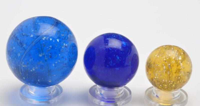 Appraisal: Lot of Mica Marbles Description Includes two large blue and