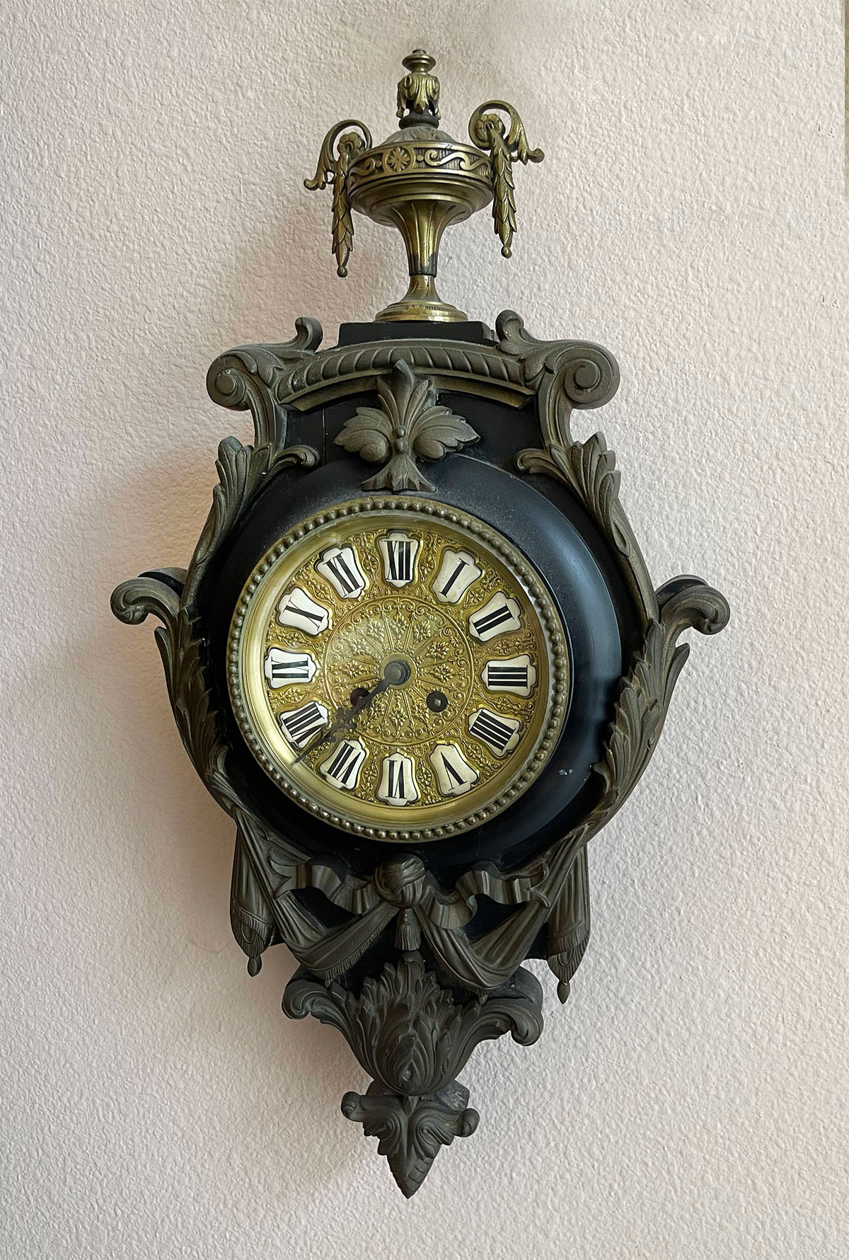 Appraisal: WALNUT WALL CLOCK WITH URN FINIAL Black lacquered wood clock