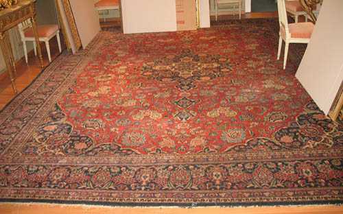 Appraisal: KESHAN old Red ground with blue central medallion patterned with