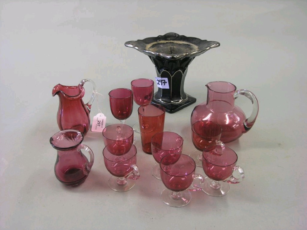 Appraisal: Victorian cranberry glass to include a set of six custard