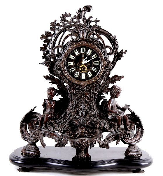 Appraisal: Rococo Style Modern French Putti Mantel Clock For your consideration