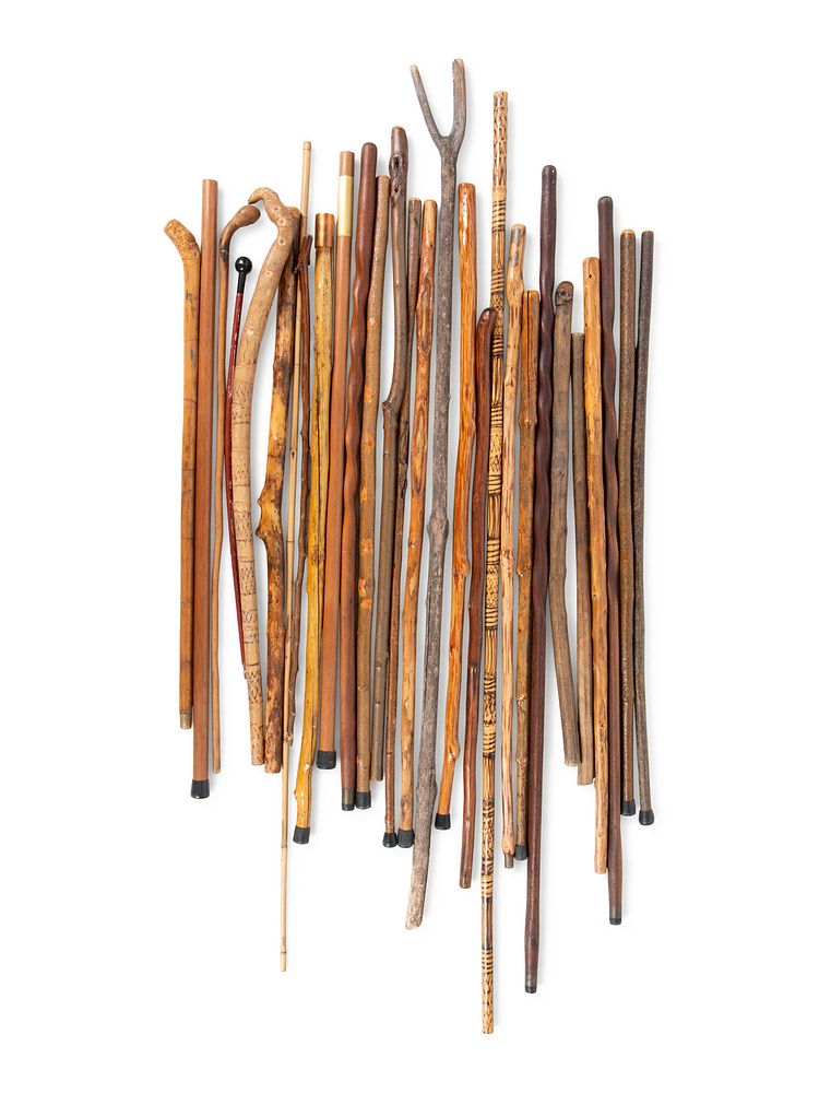 Appraisal: A Large Collection of Carved Canes and Walking Sticks A